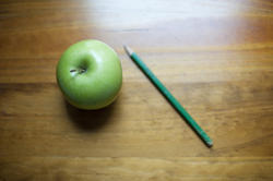 6957   Fresh green apple and a pencil