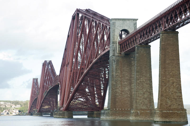 Low angle oblique view of the cantilever Forth Rail Bridge, Scotland, which crosses the Forth Of Firth into Edinburgh