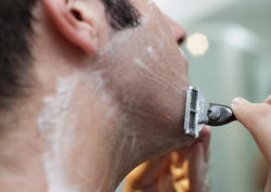 6937   Male grooming concept of man shaving