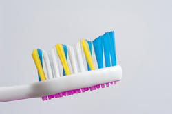 6914   Toothbrush head with tongue scrubber