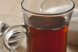 11594   Glass mug of hot black tea