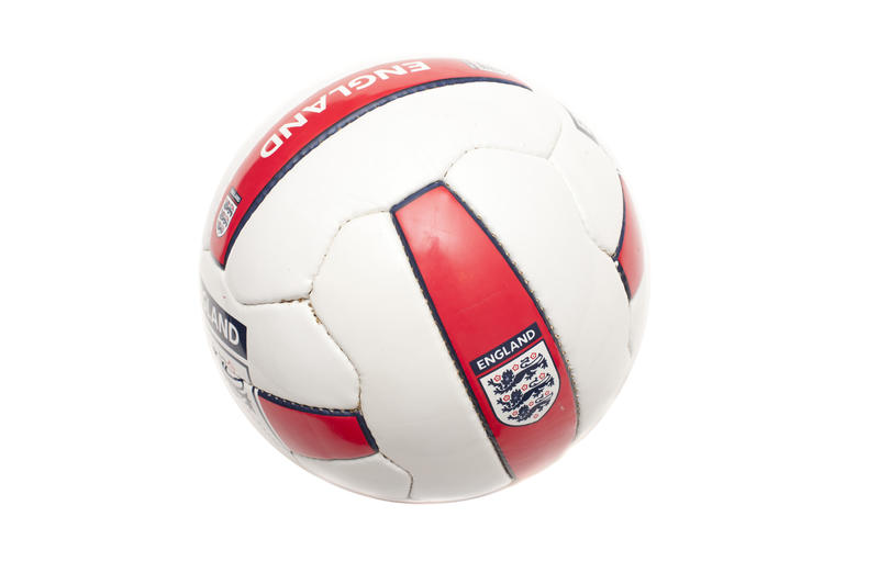 Isolated England soccer ball in red and white with the English emblem for the World Cup Soccer isolated on white