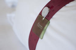 8904   Tag on a hotel pillow denoting the firmness