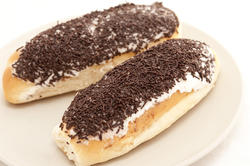 10414   Iced bun topped with chocolate sprinkles