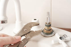 10176   Repairing a faucet with a mole grip pliers