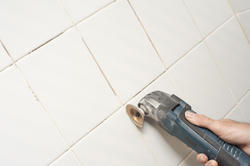 10178   Removing grout between wall tiles